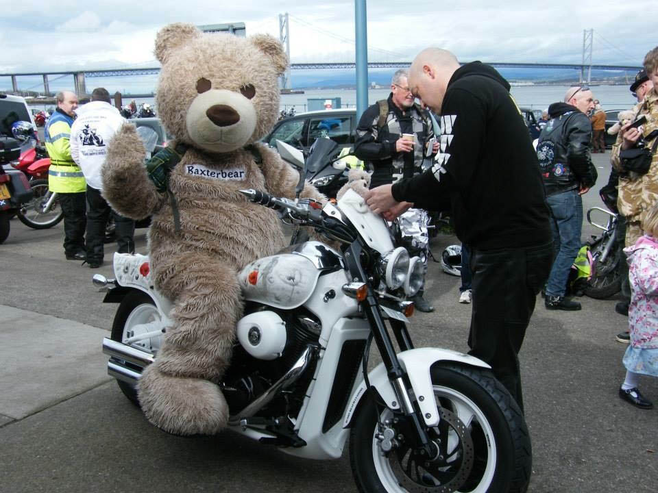 Baxterbear Rides Off on Poppy Bike