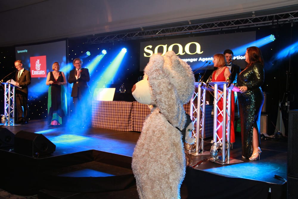 On Stage from left to right are Janice Hogarth, Jimmy Martin, Alan Glen (SPAA Vice President), Denise Holmes (Emirates Airlines) Joanne Dooey (Love to Travel)